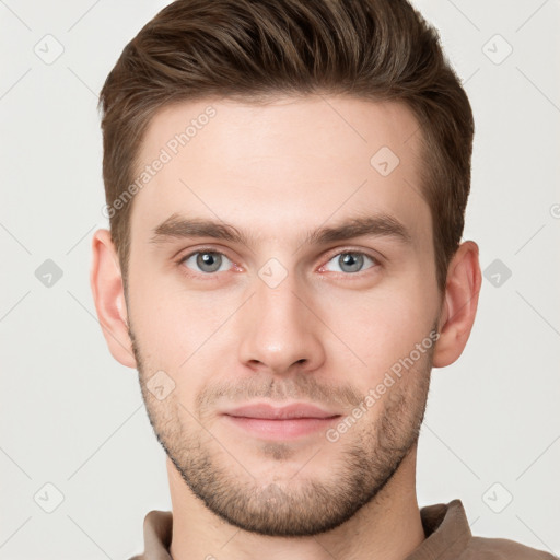 Neutral white young-adult male with short  brown hair and grey eyes