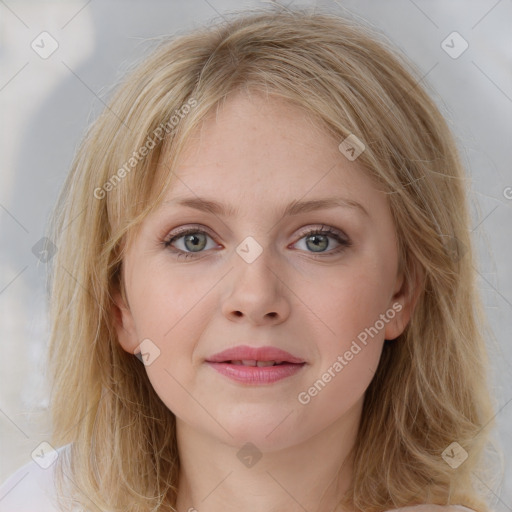 Joyful white young-adult female with medium  brown hair and blue eyes