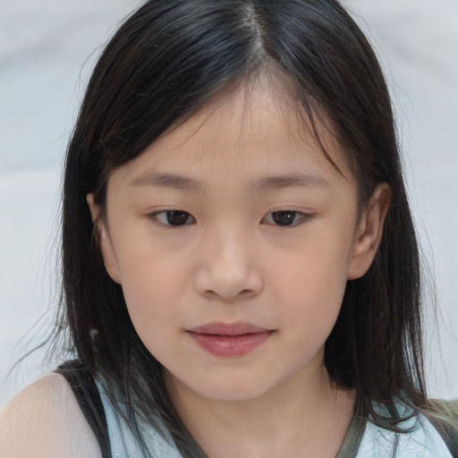 Joyful asian child female with medium  brown hair and brown eyes