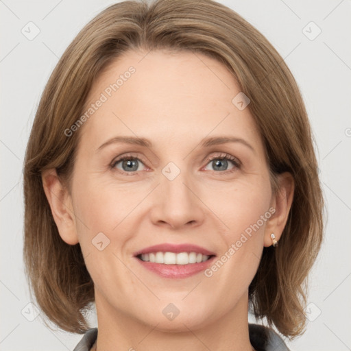 Joyful white adult female with medium  brown hair and grey eyes