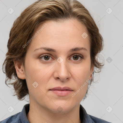 Joyful white adult female with medium  brown hair and grey eyes