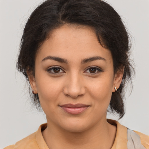 Joyful asian young-adult female with medium  brown hair and brown eyes