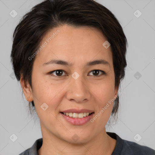 Joyful white adult female with medium  brown hair and brown eyes