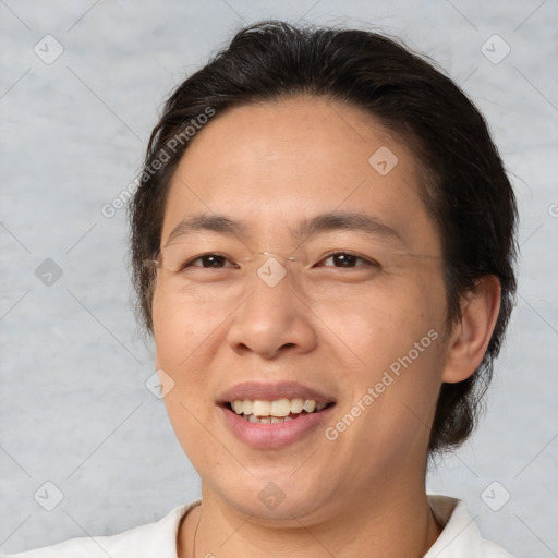 Joyful white adult female with medium  brown hair and brown eyes