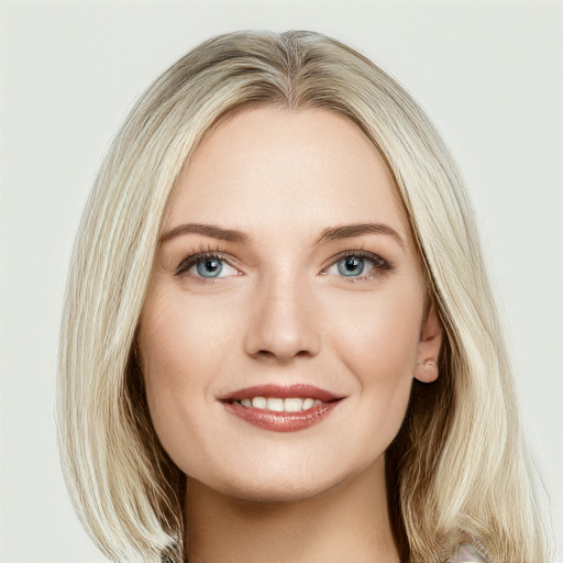 Joyful white young-adult female with long  brown hair and blue eyes