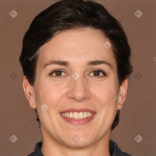 Joyful white adult female with short  brown hair and brown eyes