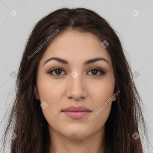 Joyful latino young-adult female with long  brown hair and brown eyes