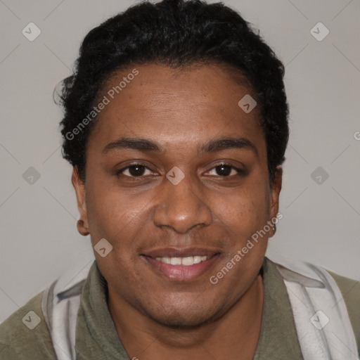 Joyful black adult female with short  brown hair and brown eyes