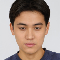 Neutral asian young-adult male with short  brown hair and brown eyes