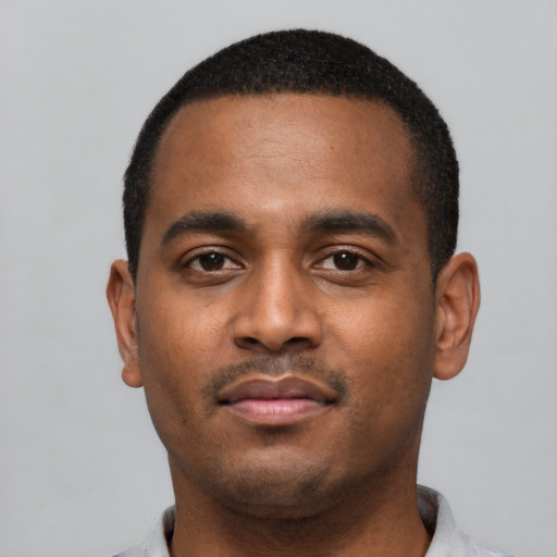 Neutral black young-adult male with short  black hair and brown eyes