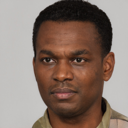 Neutral black young-adult male with short  black hair and brown eyes