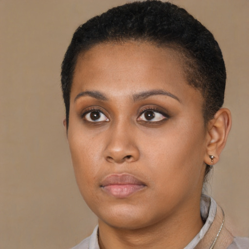 Neutral latino young-adult female with short  brown hair and brown eyes