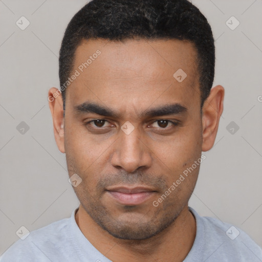 Neutral latino young-adult male with short  black hair and brown eyes