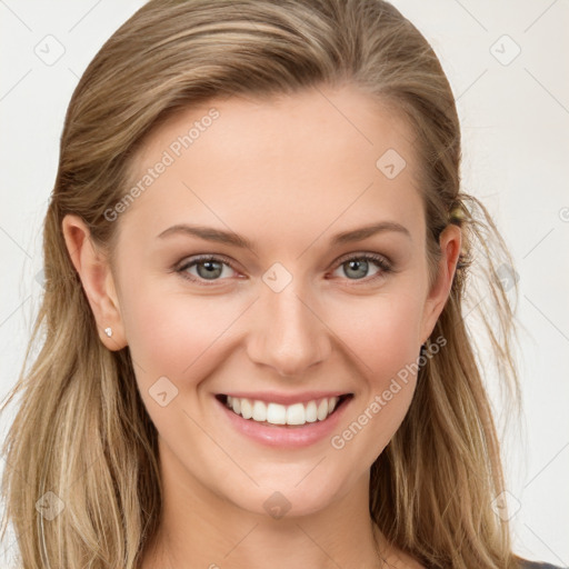 Joyful white young-adult female with long  brown hair and blue eyes