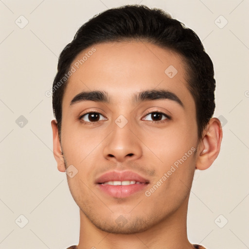 Joyful latino young-adult male with short  black hair and brown eyes