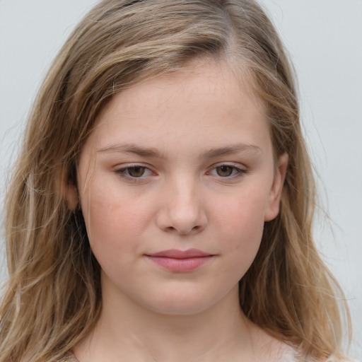 Joyful white child female with long  brown hair and grey eyes