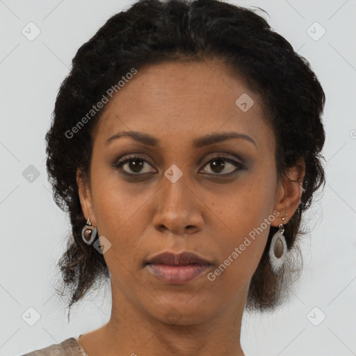 Neutral black young-adult female with medium  brown hair and brown eyes