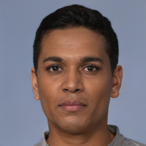 Neutral latino young-adult male with short  black hair and brown eyes