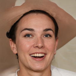 Joyful white adult female with short  brown hair and brown eyes