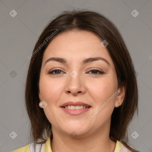 Joyful white young-adult female with medium  brown hair and brown eyes