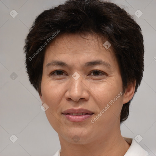 Joyful white adult female with short  brown hair and brown eyes