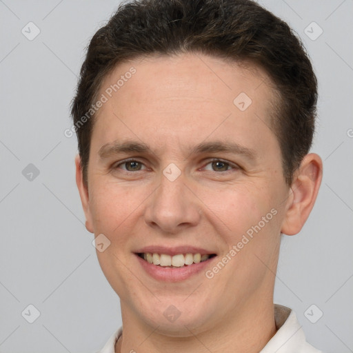 Joyful white young-adult male with short  brown hair and brown eyes