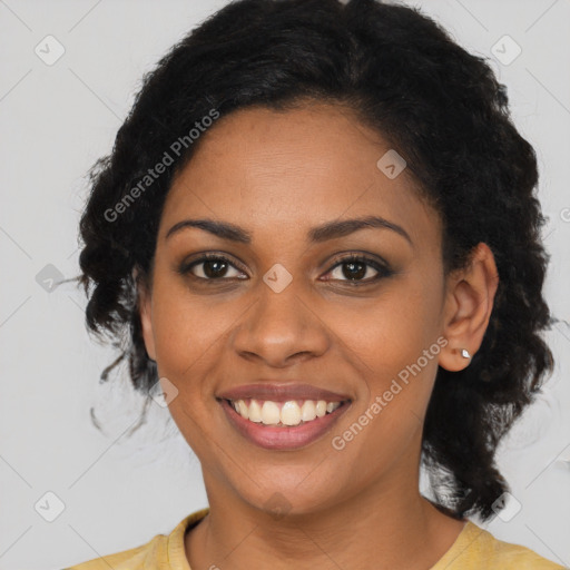 Joyful black young-adult female with medium  black hair and brown eyes