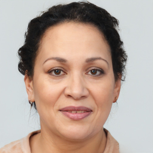 Joyful white adult female with short  brown hair and brown eyes