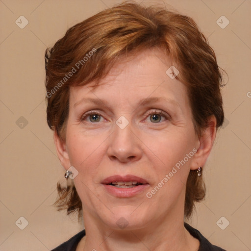 Joyful white adult female with medium  brown hair and brown eyes