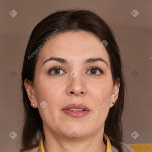 Joyful white adult female with medium  brown hair and brown eyes