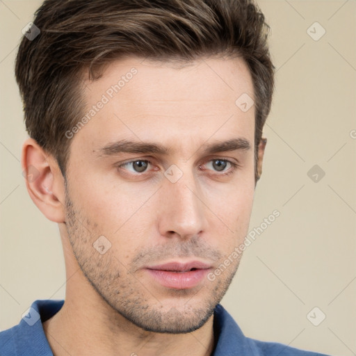 Neutral white young-adult male with short  brown hair and brown eyes