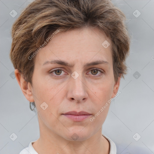 Joyful white adult female with short  brown hair and grey eyes