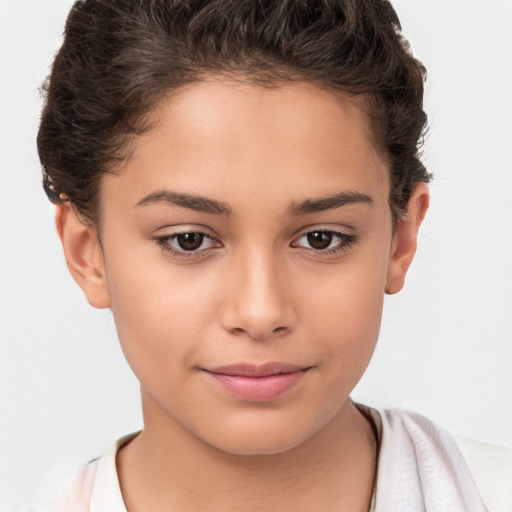 Joyful white child female with short  brown hair and brown eyes