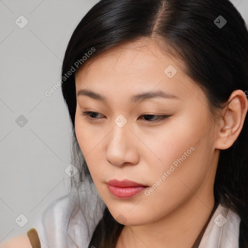 Neutral asian young-adult female with medium  brown hair and brown eyes