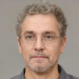 Neutral white middle-aged male with short  brown hair and brown eyes