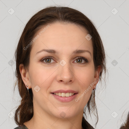 Joyful white young-adult female with medium  brown hair and brown eyes