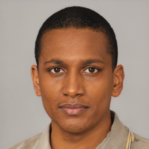 Neutral black young-adult male with short  black hair and brown eyes