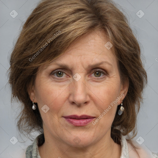 Joyful white adult female with medium  brown hair and grey eyes