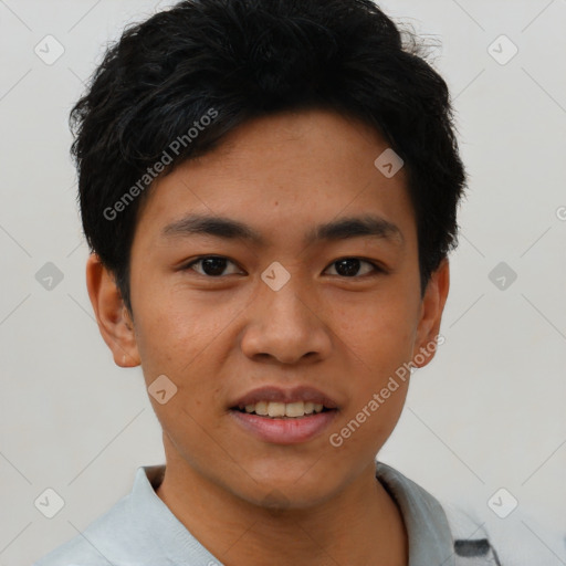 Joyful asian young-adult male with short  black hair and brown eyes