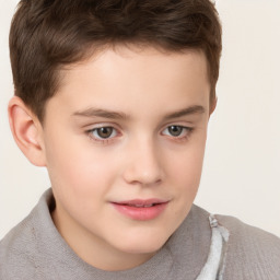 Joyful white child male with short  brown hair and brown eyes