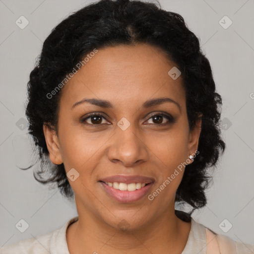 Joyful black young-adult female with short  black hair and brown eyes