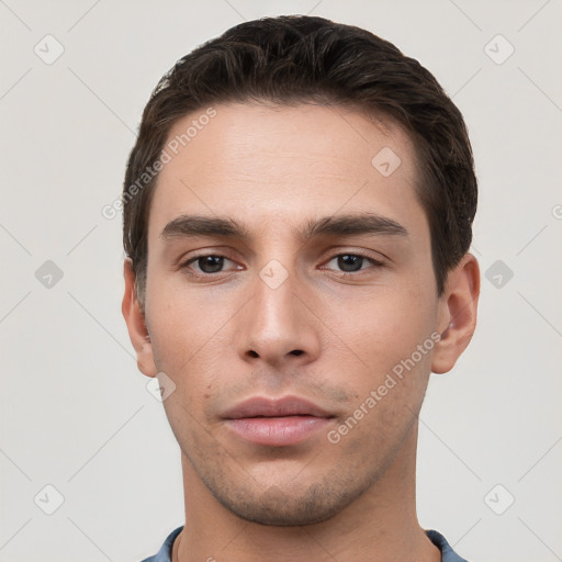 Neutral white young-adult male with short  brown hair and brown eyes