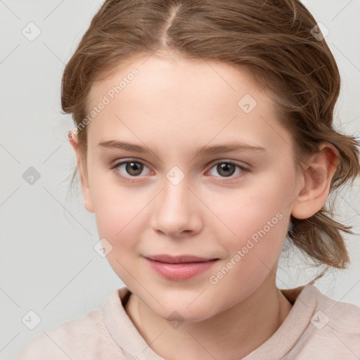 Joyful white child female with medium  brown hair and grey eyes