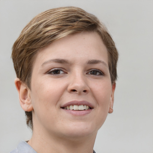 Joyful white young-adult female with short  brown hair and grey eyes