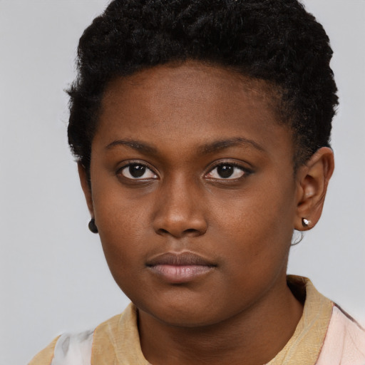 Neutral black young-adult female with short  brown hair and brown eyes