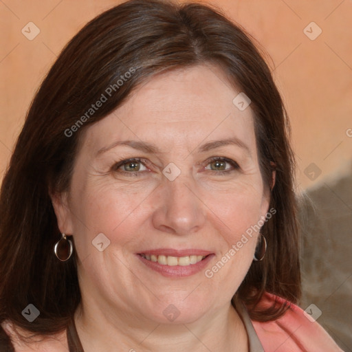 Joyful white adult female with medium  brown hair and brown eyes