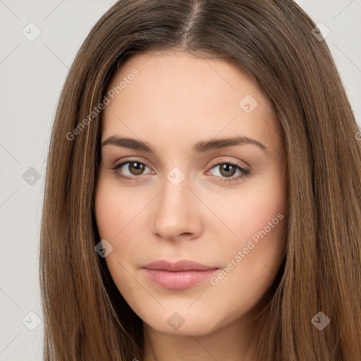 Neutral white young-adult female with long  brown hair and brown eyes