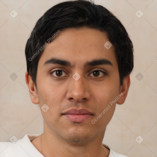 Neutral latino young-adult male with short  black hair and brown eyes