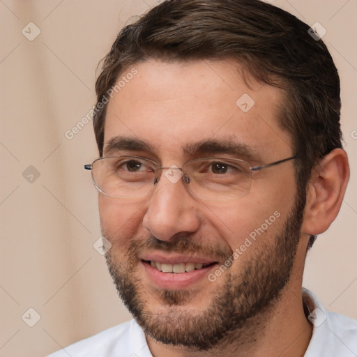 Joyful white adult male with short  brown hair and brown eyes