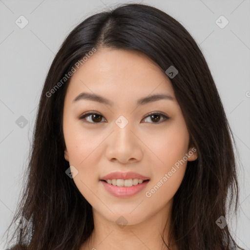 Joyful asian young-adult female with long  brown hair and brown eyes